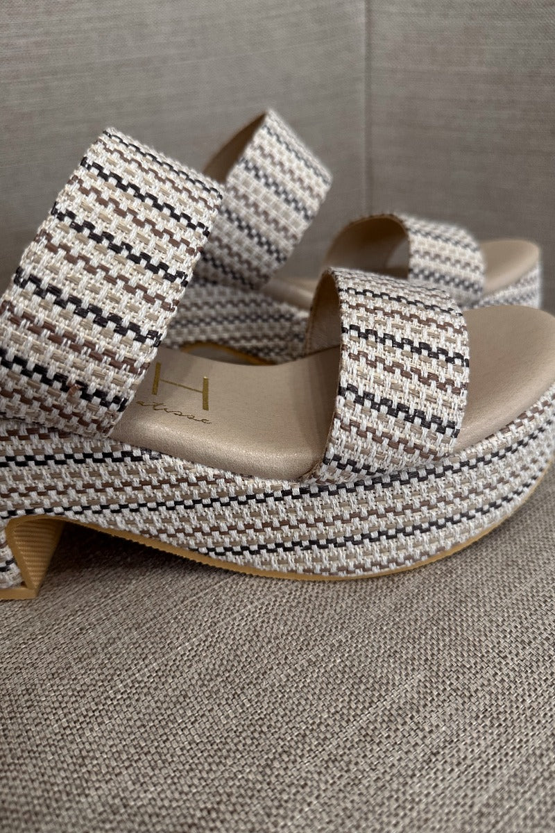 Close up view of the Ocean Ave Platform Sandal in Ivory Mosaic which  features ivory, natural and brown knit fabric, two straps, slide-on style, monochrome platform sole and block heel.