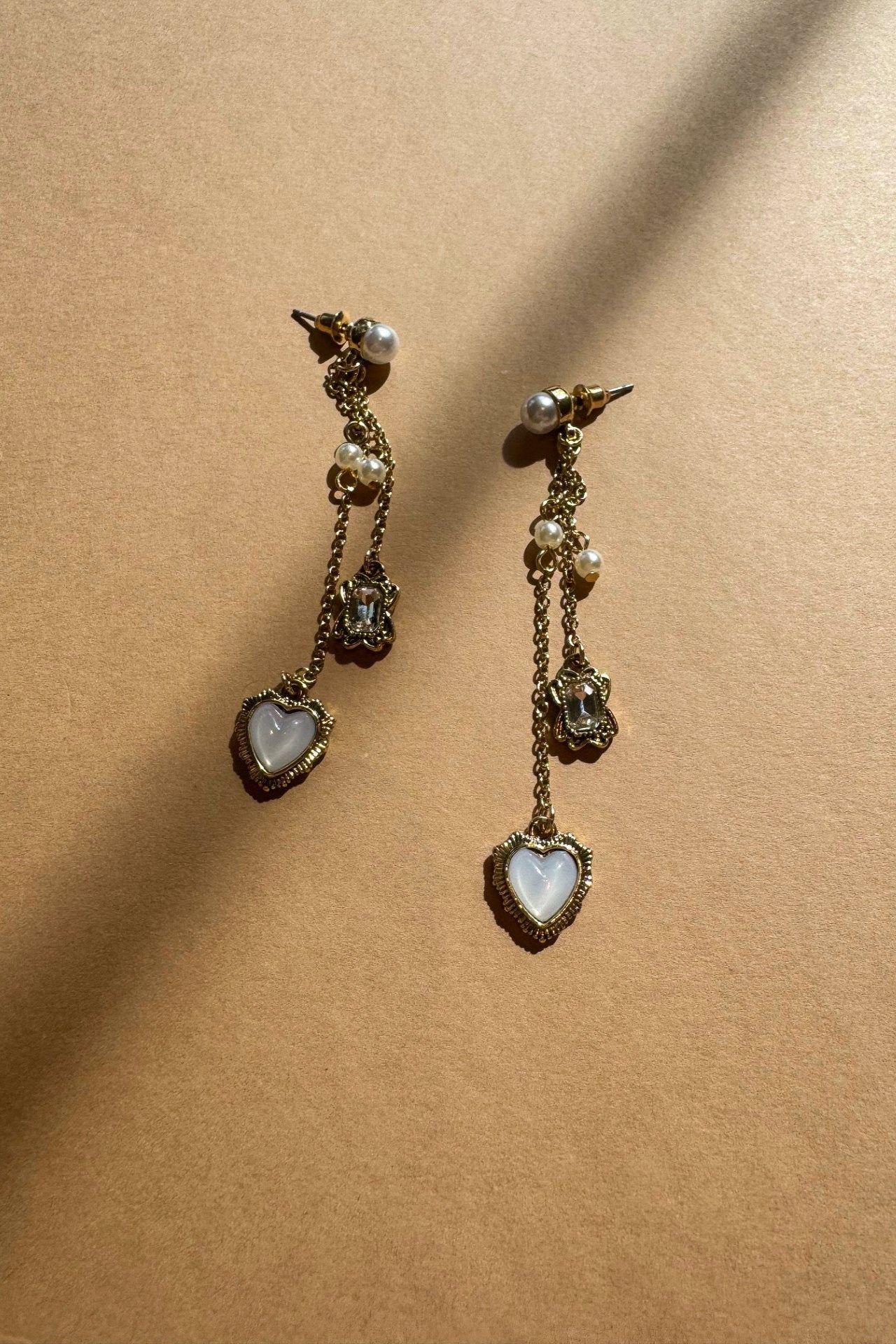 Leslie Gold & Pearl Heart Dangle Earring- flat lay view