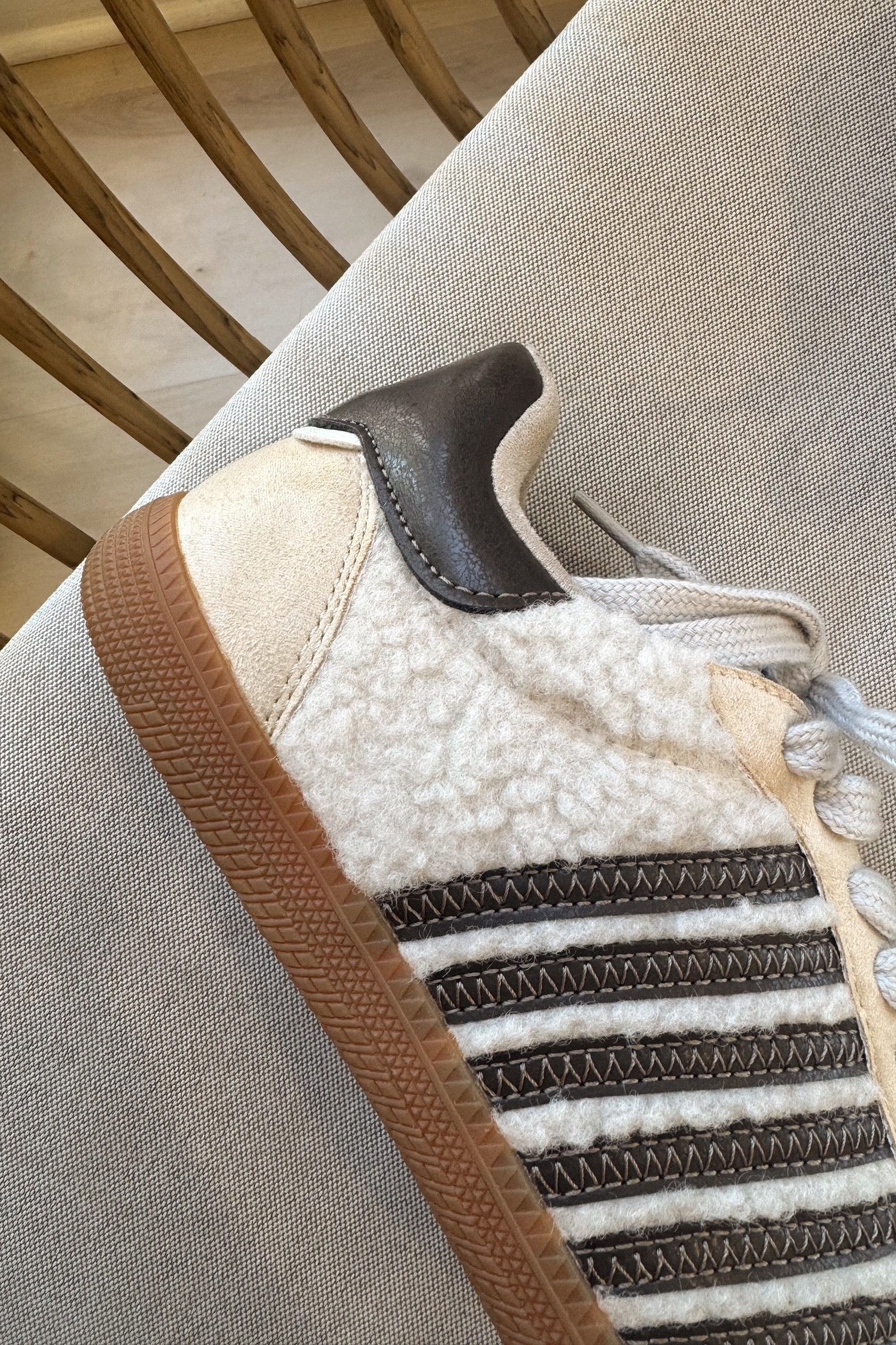 Shu Shop Stevie Beige Shearling Sneaker- close up heel side view