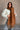 Marlowe Brown Fringe Scarf - front view on model