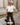 models wearing white top and pants