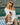 model wearing white american flag sweater