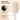 Beige hairbrush with features highlighted on a beige background