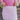 Close front view of model wearing the Shine On Sequin Skirt in Pink, which features light pink fabric with a sequined overlay, ruching on the front, and an elastic waist.