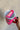 Top view - Hand is holding the You Can Do It Tumbler which is a hot pink 40 oz  tumbler featuring a silver "You Can Do It" graphic.