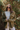 Font view of the  Destination Trip Teddy Shacket features olive lightweight teddy fabric, a snap-up front with gold buttons and a collar, chest pockets, and long sleeves with snap-closure cuffs.
