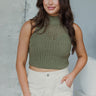 Front view of model wearing the I Go Back Tank in Olive which features olive green chenille knit fabric, high neckline and sleeveless.