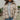 Frontal view of the Weekend Plans Jacket that features a taupe colored material, a grey and ivory plaid, a collar neck, a long cuffed sleeve, and a button-up front