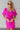 Frontal view of the Sitting Pretty Mini Dress that features a magenta colored chiffon material, a surplice neckline, short sleeves, a surplice front, a back zipper, and a mini length