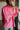 Back view of the Seasons Change Jacket that features a pink colored corduroy material, a collar and lapel neckline, a two button front closure, a long sleeve, two front pockets, and a back slit.