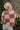 Back view of the next move Sweater that features a rose colored knit material, a monochromatic checkered design, a round neck, and long sleeves.