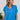 Frontal view of the Irreplaceable Top that features a royal blue material, a round neckline with a ruffle detail, a cut-out at the chest with adjustable ties, a short smocked sleeve, and a flowy fit.