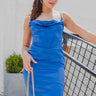 Frontal view of the Royalty Midi Dress that features a royal blue silk material, a sleeveless design with thin adjustable straps, a bustier design, a back zipper closure, and a midi length