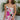 Frontal view of the Meet Me At The Disco Dress that features a multi-colored print, a V neckline, a sleeveless design with thin adjustable straps, a back zipper closure, and a mini length.