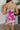 Back view of the Meet Me At The Disco Dress that features a multi-colored print, a V neckline, a sleeveless design with thin adjustable straps, a back zipper closure, and a mini length.