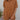 Frontal view of the Lady May Romper that features a brown fabric, a collar neckline, a short cuffed sleeve, a button-up front, two front pockets at the chest, a cuffed bottom hem, and two back pockets.