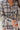 Frontal view of the Remember Me top that features a navy and blue plaid, a collar neck, a button-up front, a front pocket, and a long cuffed sleeve.