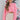 Front view of model wearing the All I Want Sweater, that has pink knit fabric with thick ribbed trim, a high round neck, and drop-shoulder long sleeves with folded cuffs. Sweater is tucked up.
