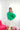 Front view of model wearing the Make A Statement Sweater in Green that has green knit fabric, a cropped waist, a round neckline, and long balloon sleeves
