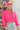Front view of model wearing the Make A Statement Sweater in Pink that has pink knit fabric, a cropped waist, a round neckline, and long balloon sleeves.