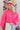 Front view of model wearing the Make A Statement Sweater in Pink that has pink knit fabric, a cropped waist, a round neckline, and long balloon sleeves.