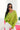 Front view of model wearing the Go Boldly Chenille Sweater in Green that has lime green chenille fabric, a v-neck and back, and long batwing sleeves