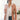 Front view of model wearing the Business As Usual Blazer in Blush, that has  a dusty pink material with a full lining, a lapel and a collar, shoulder pads, cuffed sleeves, and faux front pockets. Worn over white blouse.