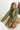 Front view of model wearing the Warm And Fuzzy Pullover in Olive that has soft fleece fabric, long raglan sleeves, ribbed trim, and a round neckline.