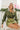 Front view of model wearing the Love Letter Cropped Satin Top that has olive green satin fabric, a collared surplice neckline with a snap closure, a cropped waist with an elastic back, and long sleeves with buttoned cuffs.