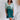 Frontal view of the Sweet Summer Romper that features a multi-colored design, a V neckline, a half cuffed sleeve, a three tiered design, two side pockets, a shorts lining, a V back with a tie detail, a flowy fit, and a mini length.