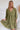Frontal view of the Wish You Well Dress that features an olive gauze material, a frayed V neckline, a 3/4 sleeve, a button-up front, a tiered babydoll design, a flowy fit, and a mini length. 