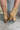 The Slay Western Bootie is a western inspired bootie, featuring a tan suede, western inspired embroidery through out, a pointed toe, a 3" stacked heel, and pull-on tabs for entry.