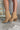 The Slay Western Bootie is a western inspired bootie, featuring a tan suede, western inspired embroidery through out, a pointed toe, a 3" stacked heel, and pull-on tabs for entry.