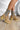 The Melanie Knit Boot is a mid-calf boot featuring a knit upper, a rubber lug sole, a 1" platform, and a 3" heel. 