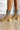 The Melanie Knit Boot is a mid-calf boot featuring a knit upper, a rubber lug sole, a 1" platform, and a 3" heel. 