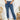 Frontal view of the Flying Monkey: Ease Mom Jeans that features a dark wash denim, a front button and zip closure, two front pockets, a cuffed bottom hem, two back pockets, and a mom jean fit.