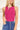 Frontal view of the West Side Bodysuit that features a magenta cotton material, a round neckline, a sleeveless design with thick straps, a bikini bottom, and a snap closure.