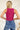 Back view of the West Side Bodysuit that features a magenta cotton material, a round neckline, a sleeveless design with thick straps, a bikini bottom, and a snap closure.