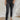 
Frontal view of the Flying Monkey: Amie Straight Leg Jeans that features a faded black wash denim, a high-rise fit, a four button closure, two front pockets, a distressed ankle hem, two back pockets, and a straight leg fit.
