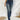 Frontal view of the Rooted Denim: Elodie Bootcut Jeans that features a dark wash denim, a front button and zipper closure, two front pockets, two back pockets, and a bootcut fit.