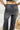 Back view of the Rooted Denim: Crue Flare Jeans that features a faded black wash denim, a front two button and zip closure, two front pockets, a frayed bottom hem, two back pockets, and a flare fit.