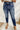 Frontal view of the Kancan: Maisie Straight Leg Jeans that features a dark wash denim with distress details, a high-rise fit, a front two button and zip closure, two front pockets, a faded ankle hem, two back pockets, and a straight leg fit.