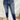 Frontal view of the Kancan: Maisie Straight Leg Jeans that features a dark wash denim with distress details, a high-rise fit, a front two button and zip closure, two front pockets, a faded ankle hem, two back pockets, and a straight leg fit.