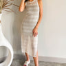 Front view of model wearing the Time After Time Cover Up that has off white sheer knit fabric, monochromatic stripe details, midi length, slits on each side, a round neckline and a sleeveless design