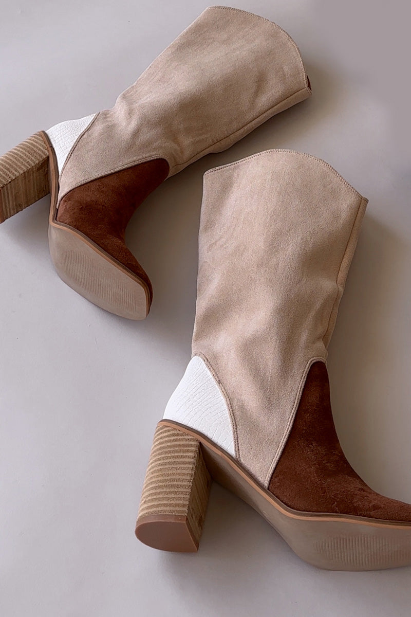 Flat lay view of the Kristin Tri-Tone Boot which features beige, white and camel suede upper fabric, color-block pattern, square toe, curved topline and wooden block heel.