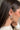 Side view of model wearing the String Multi Lights White Open Hoop which features mini white open hoops with gold and multi color string light details.