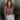 Close up view of model wearing the Extra Mocha Please Top which features ribbed mocha-colored fabric, a round neckline, and fitted long sleeves.