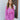 Front view of model wearing the Looking At You Romper, which features textured magenta fabric, a surplice neckline, a tie belt, and long bell sleeves.