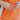 The Something Orange Ring Set is a set of three rings; a gold band with pink and orange hearts, a gold band with pink flowers, and a thick gold band with one large orange flower.