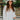 Frontal view of the In Charge Top In Ivory that features an ivory colored material, a round neck with an adjustable tie closure, a notched neckline, a long sleeve, and a flowy fit.